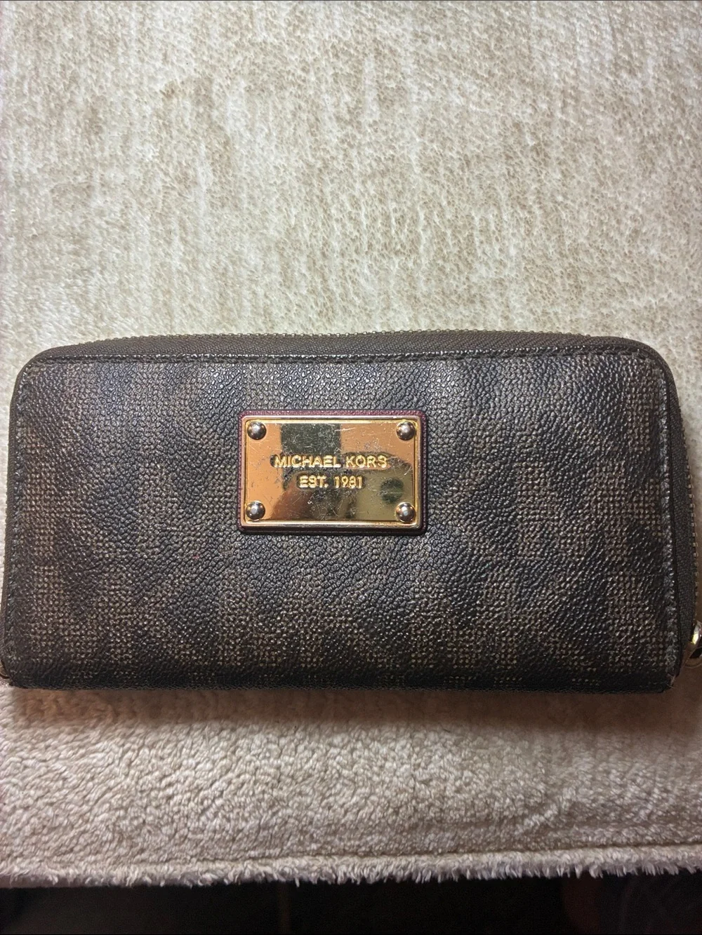 Michael Kors Dark Brown Monogram Zip Wallet with Gold Plate